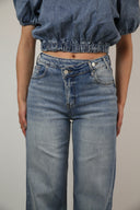 Cross waist jeans